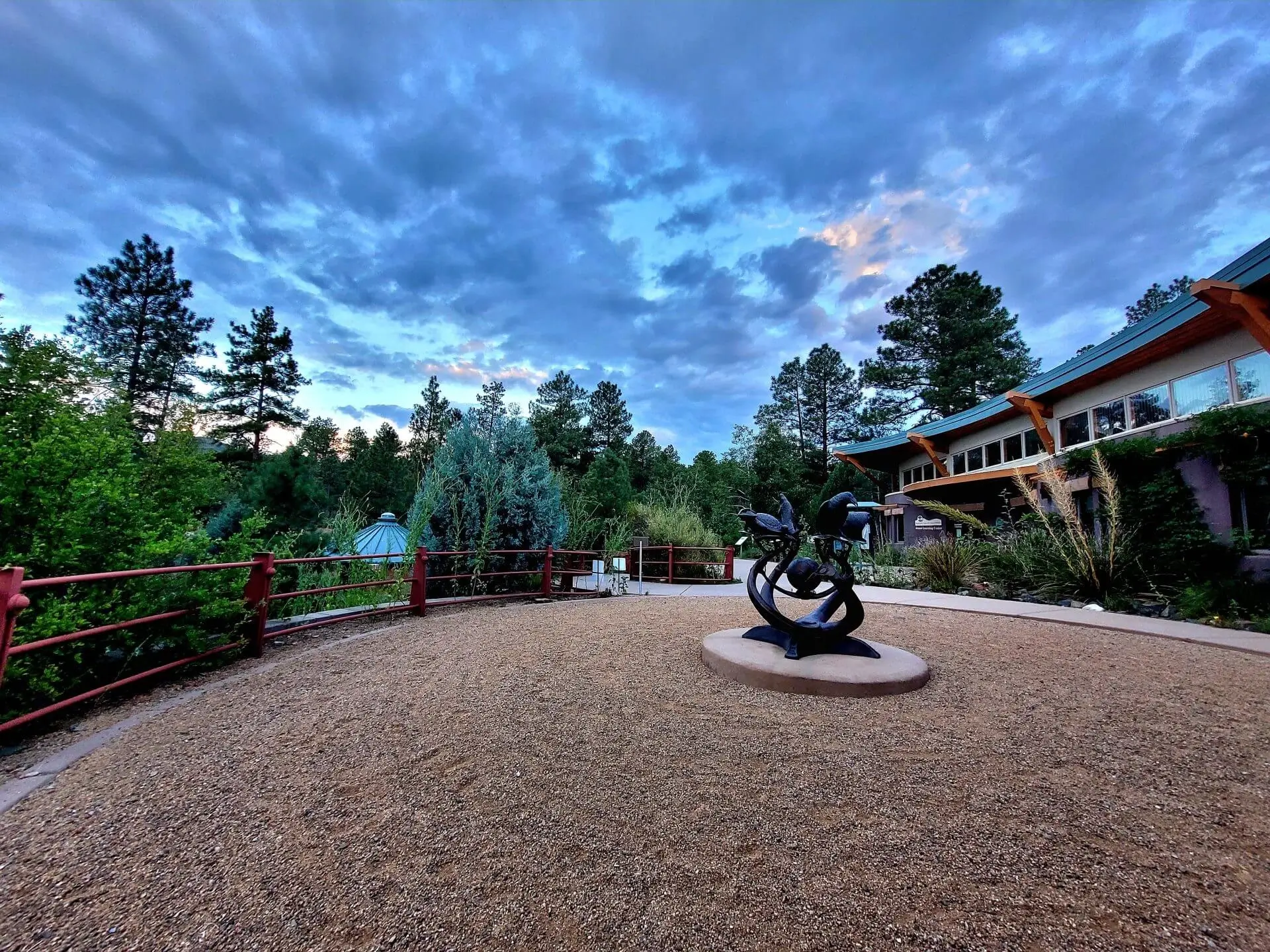 Self-serve tap wall at City Tavern with digital beer menus and wooden-handled taps