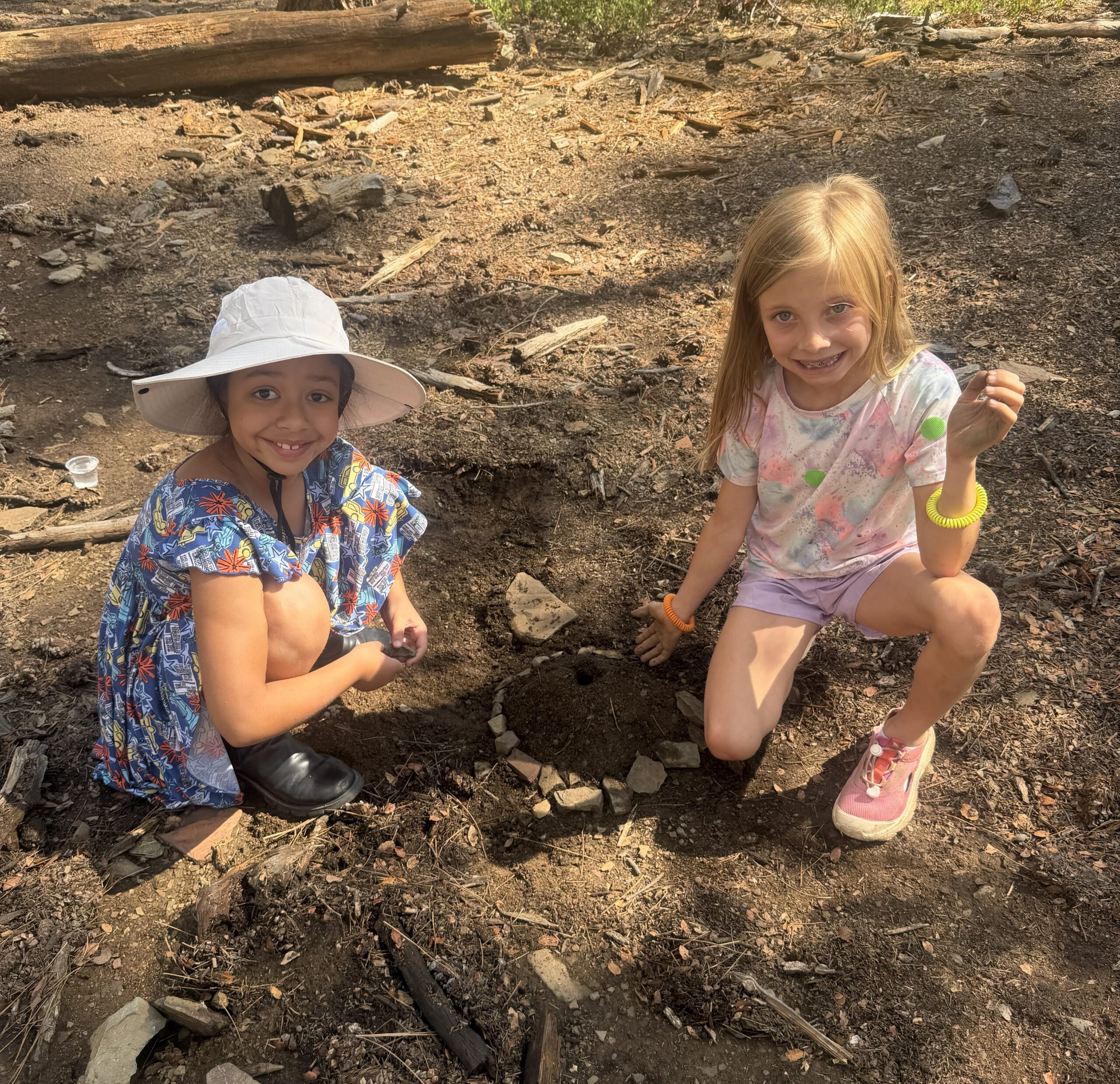 Group of students creating art natural materials.